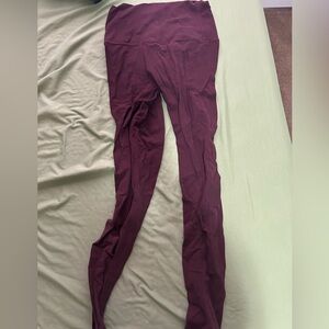 Maroon Lululemon high rise leggings size 4 with small pocket in waistband